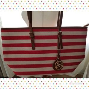 DONATED. NWOT LM Red and White stripe Purse